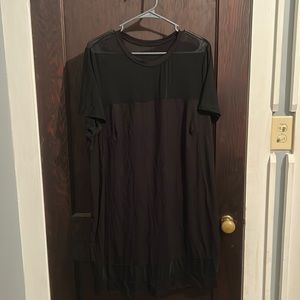 Black dress with two mesh panels